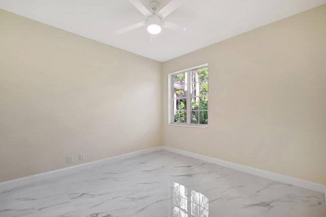 spare room featuring ceiling fan