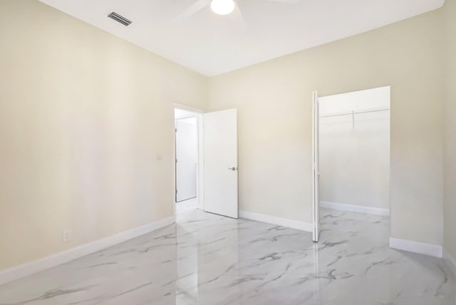 unfurnished bedroom featuring a closet and ceiling fan