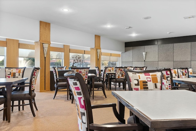 carpeted dining room with visible vents and recessed lighting