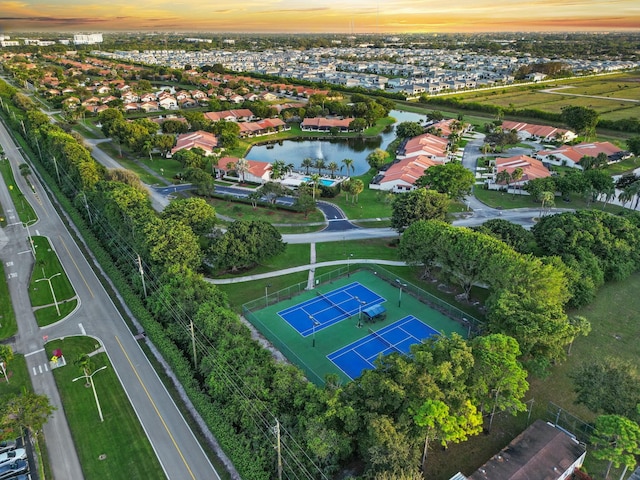 aerial view featuring a water view and a residential view