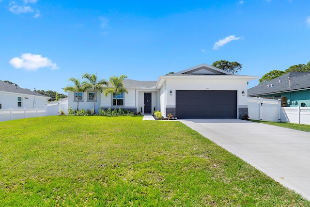 ranch-style home featuring a front yard and a garage