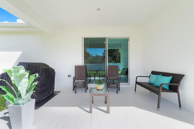 view of patio featuring a grill