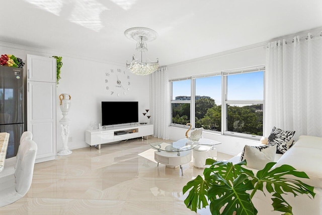 875 E Camino Real Unit 7E, Boca Raton, FL 33432 - living room featuring ornamental molding and a chandelier