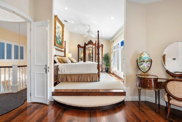 bedroom with baseboards, dark wood-style floors, visible vents, and recessed lighting