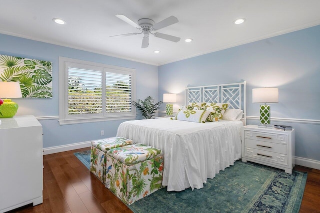 bedroom featuring dark wood finished floors, baseboards, ornamental molding, and recessed lighting