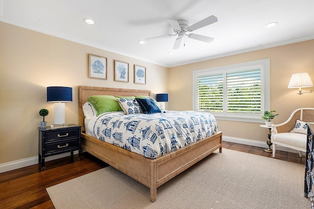 bedroom featuring baseboards, crown molding, and dark wood-type flooring