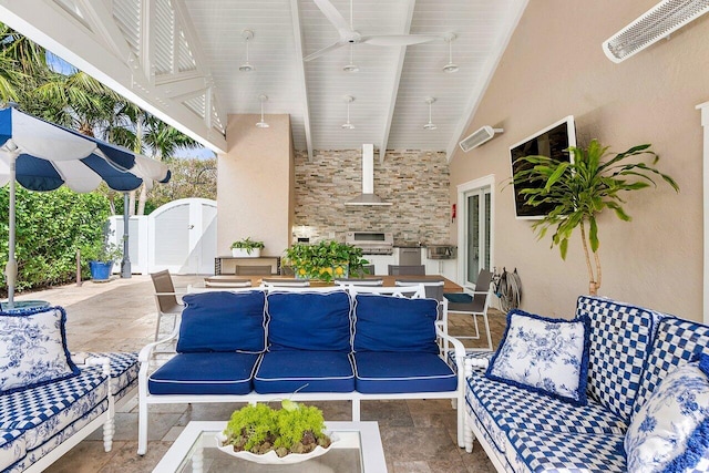 view of patio with area for grilling, visible vents, a gate, and ceiling fan