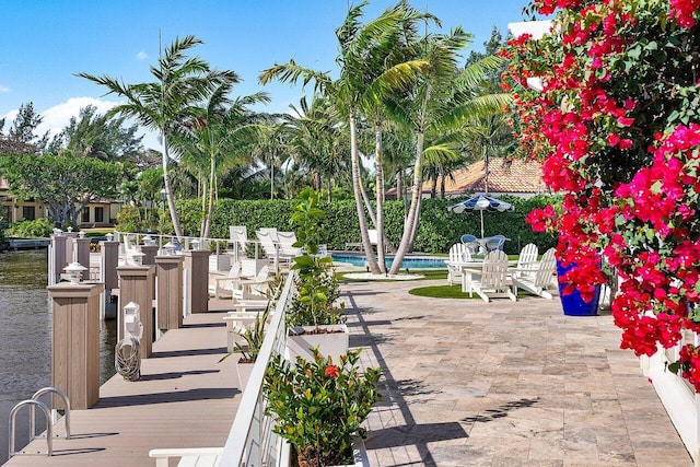 view of patio with an outdoor pool