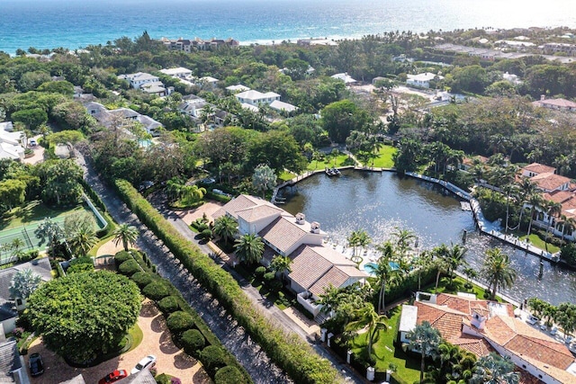 aerial view featuring a residential view and a water view