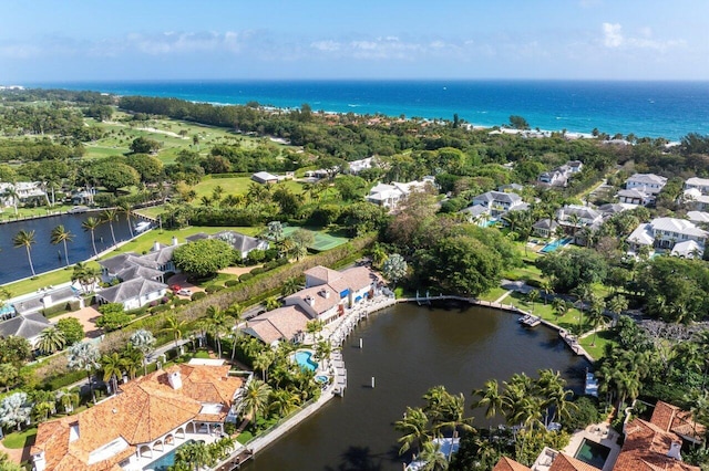 bird's eye view with a residential view and a water view