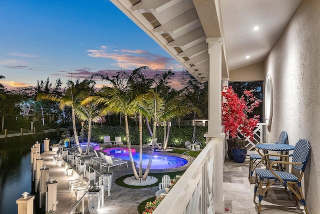 view of patio with a fenced in pool