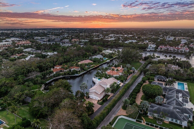 aerial view with a residential view and a water view