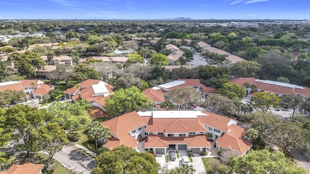 birds eye view of property with a residential view