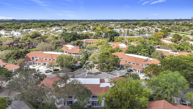 bird's eye view with a water view and a residential view