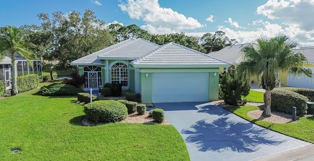 ranch-style home with a garage, concrete driveway, a tiled roof, a front lawn, and stucco siding