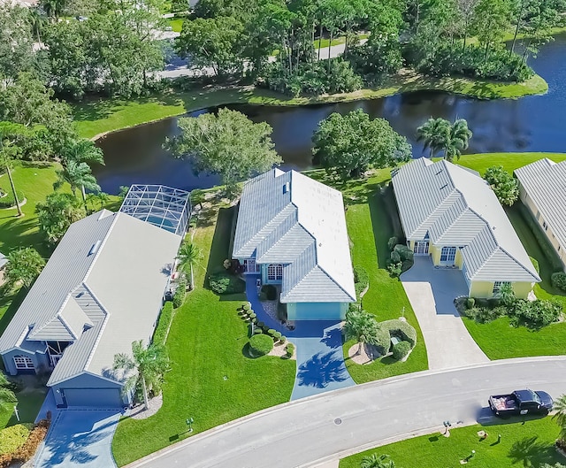 drone / aerial view with a water view