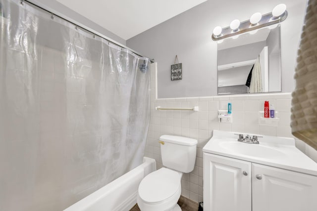 431 SW 1st Ave, Boynton Beach, FL 33435 - full bathroom with shower / tub combo with curtain, tile walls, vanity, and toilet