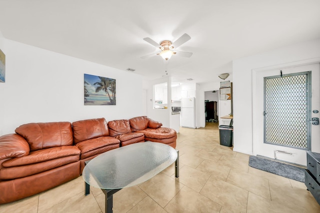 431 SW 1st Ave, Boynton Beach, FL 33435 - living room featuring light tile patterned flooring and ceiling fan