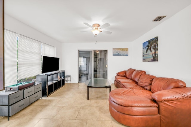 431 SW 1st Ave, Boynton Beach, FL 33435 - living room featuring ceiling fan and light tile patterned floors
