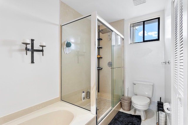 full bathroom with a garden tub, visible vents, toilet, a stall shower, and tile patterned floors