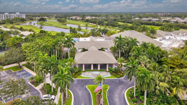 aerial view featuring view of golf course and a water view