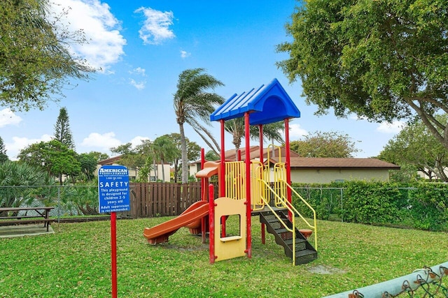 view of playground featuring a yard