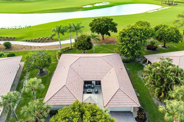 aerial view featuring a water view and golf course view