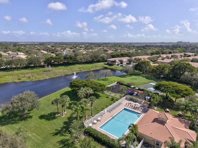 drone / aerial view with a water view