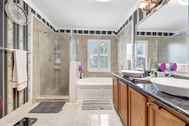 full bath featuring a stall shower, a garden tub, a sink, and double vanity