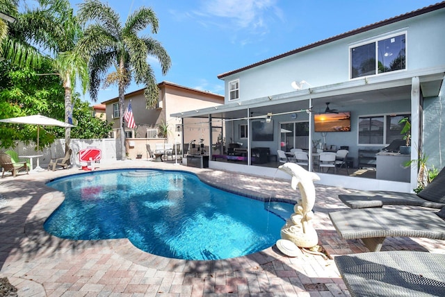 view of pool with a fenced in pool, a ceiling fan, a sunroom, a patio area, and fence