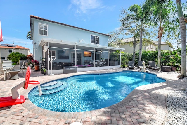 view of pool featuring a sunroom, fence, a fenced in pool, and a patio