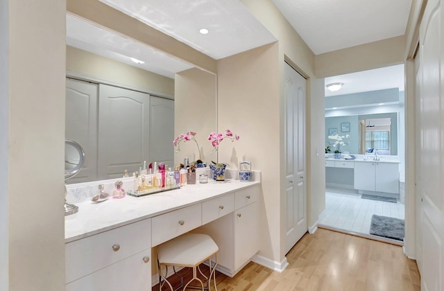 9602 Fox Trot Ln, Boca Raton, FL 33496 - bathroom featuring vanity and wood-type flooring