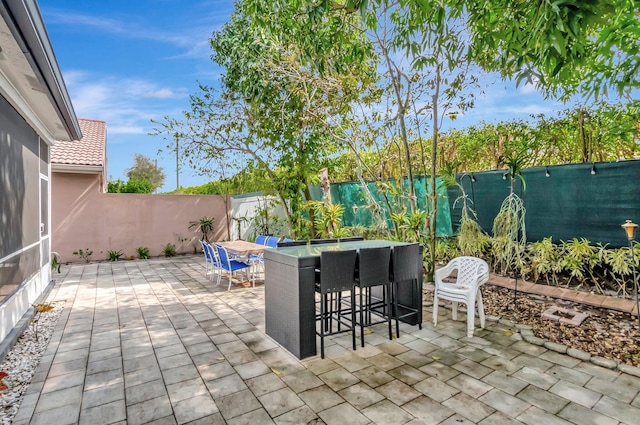 9602 Fox Trot Ln, Boca Raton, FL 33496 - view of patio with a bar