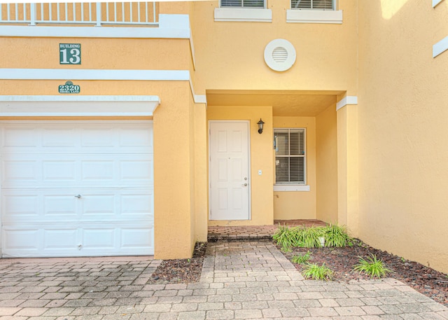 entrance to property with a garage