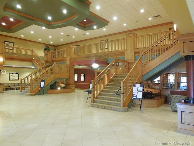 community lobby featuring visible vents and stairway