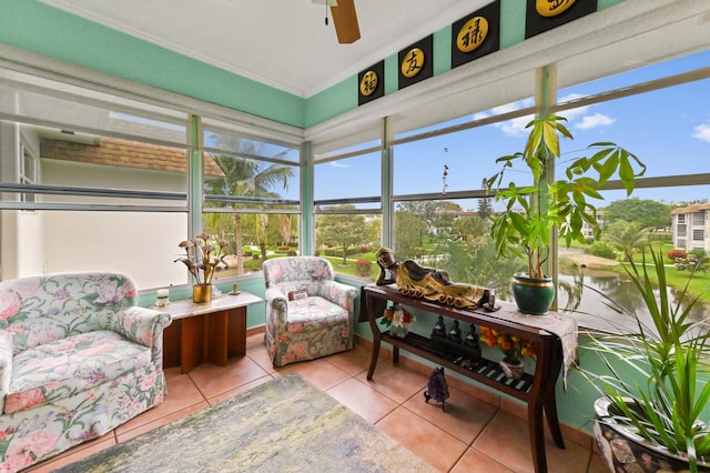 sunroom / solarium with a ceiling fan