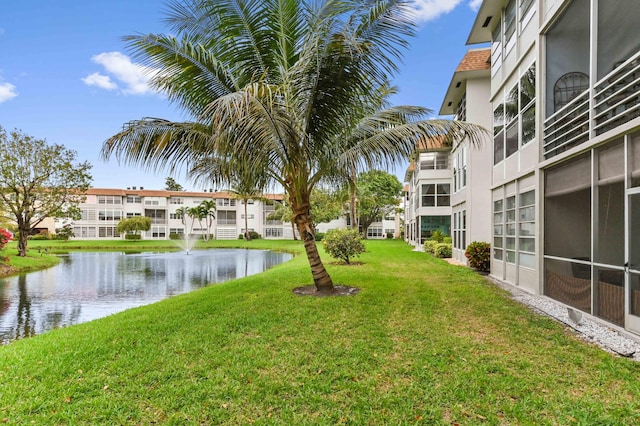 view of yard with a water view