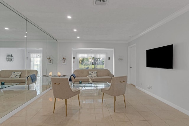 living room featuring visible vents, crown molding, baseboards, and light tile patterned floors