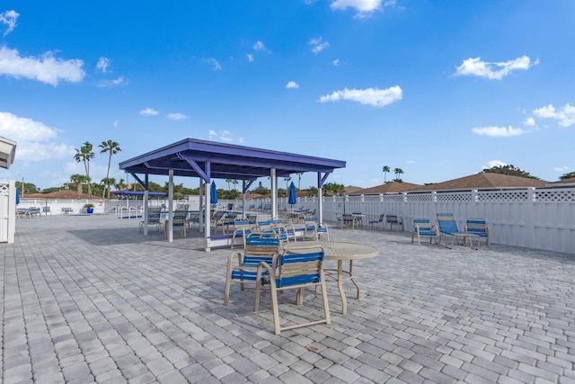 view of patio / terrace featuring fence