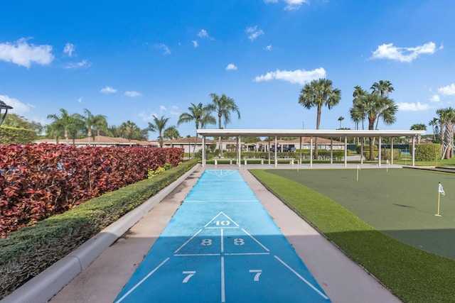 view of community featuring shuffleboard