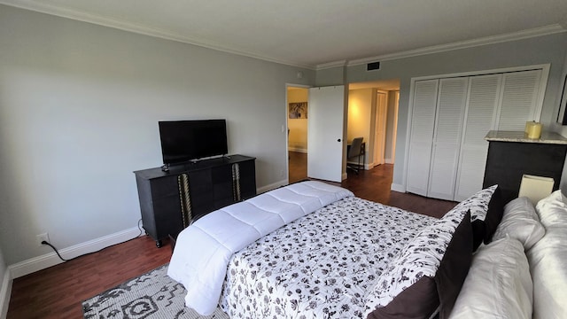 3100 N Palm Aire Dr Unit 604, Pompano Beach, FL 33069 - bedroom with a closet, dark hardwood / wood-style floors, and ornamental molding