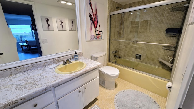 3100 N Palm Aire Dr Unit 604, Pompano Beach, FL 33069 - full bathroom with toilet, shower / bath combination with glass door, and vanity