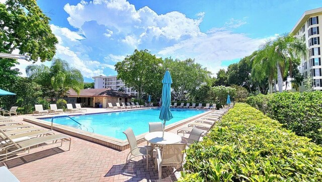 3100 N Palm Aire Dr Unit 604, Pompano Beach, FL 33069 - view of pool featuring a patio