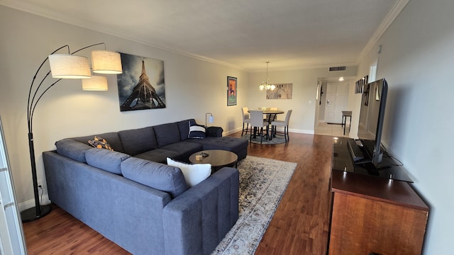 3100 N Palm Aire Dr Unit 604, Pompano Beach, FL 33069 - living room featuring dark hardwood / wood-style flooring, crown molding, and an inviting chandelier