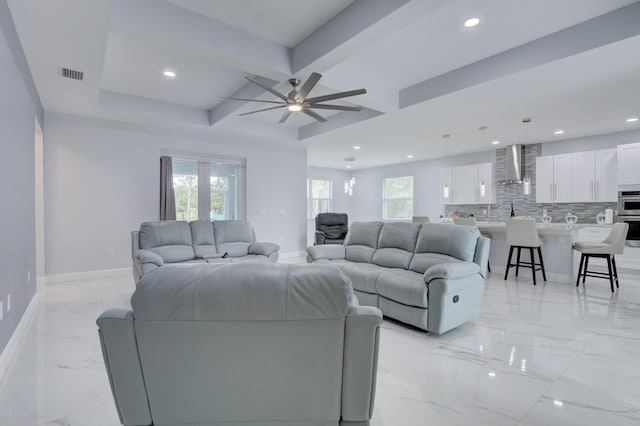 living room featuring baseboards, visible vents, coffered ceiling, marble finish floor, and recessed lighting