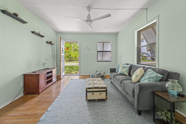 306 Fernandina St, Fort Pierce, FL 34949 - living room featuring wood finished floors, ceiling fan, and baseboards