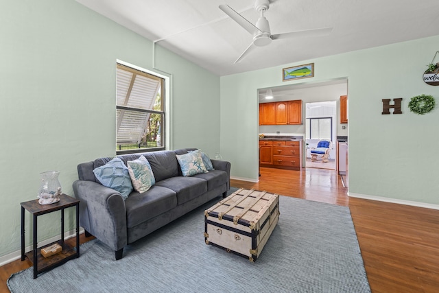 306 Fernandina St, Fort Pierce, FL 34949 - living room featuring wood finished floors, a ceiling fan, and baseboards