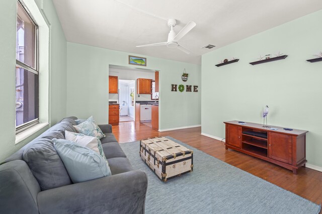 306 Fernandina St, Fort Pierce, FL 34949 - living room with wood finished floors, ceiling fan, and baseboards