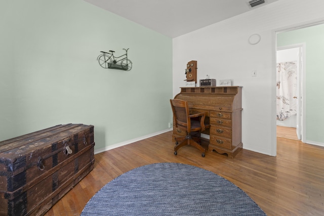 306 Fernandina St, Fort Pierce, FL 34949 - office area featuring wood finished floors and baseboards