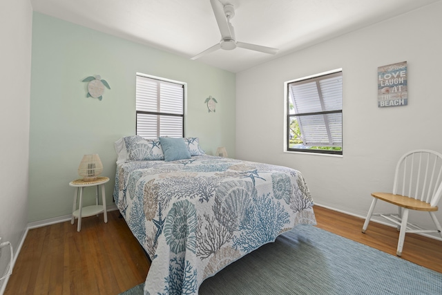306 Fernandina St, Fort Pierce, FL 34949 - bedroom featuring wood finished floors, baseboards, and a ceiling fan